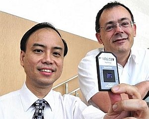 Dr Christopher Wong, founder and director, PathGEN Dx, Singapore, and collaborator Dr Martin Hibberd, along with the revolutionary PathChip (Image source: The Straits Times)